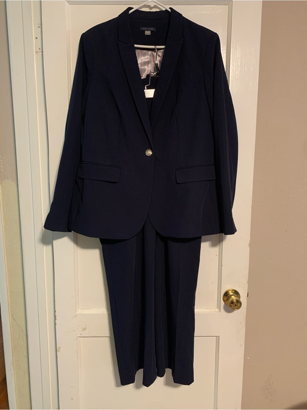 Classic Tommy Hilfiger two-piece suit. Blazer size 16 pants size 14.